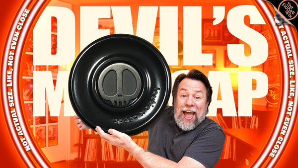 The Devil's Milk Cap fidget coin in zirc is a perfect addition to any collection.